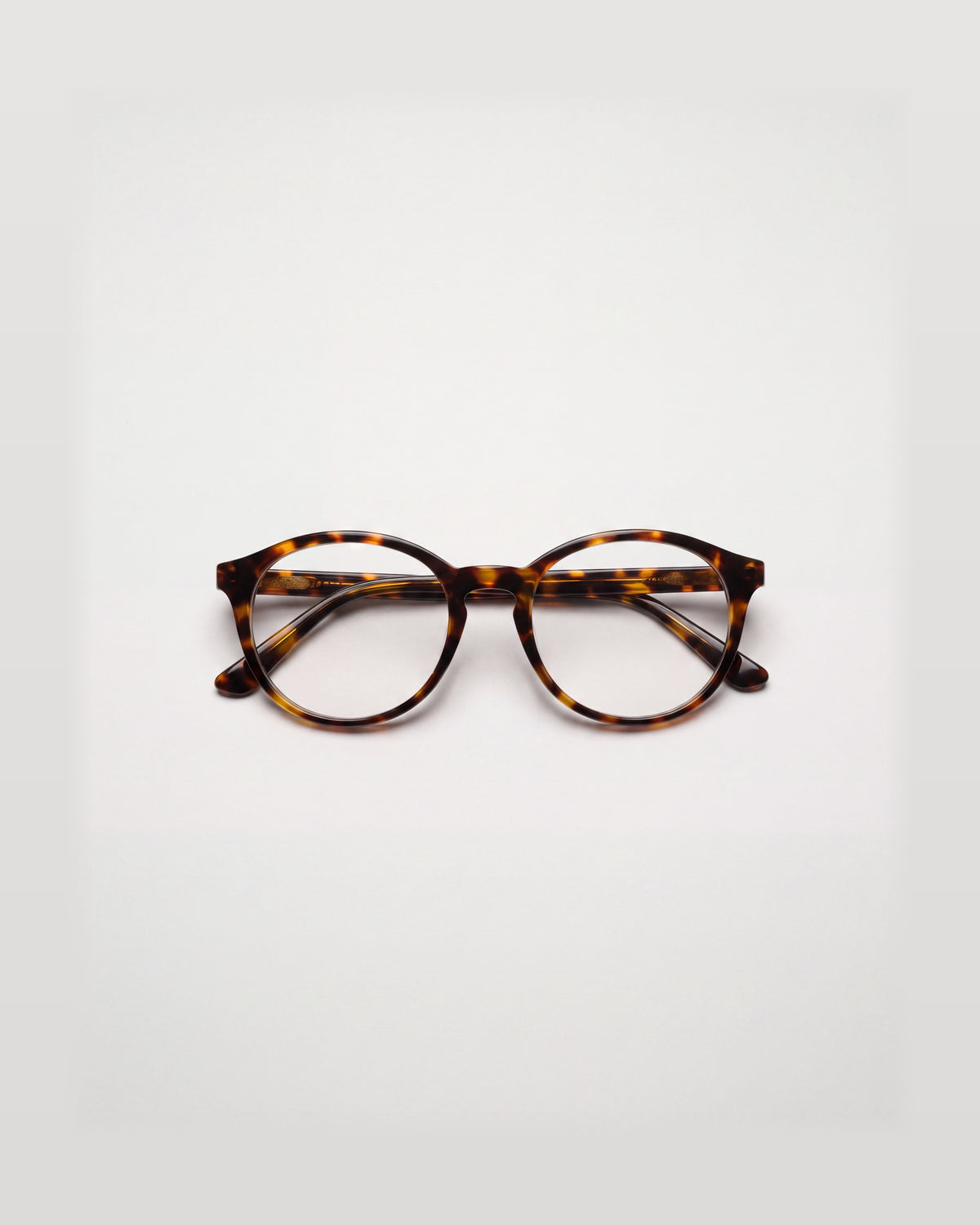 GLAS Jasmin Turtle Brown Blue Light – front view